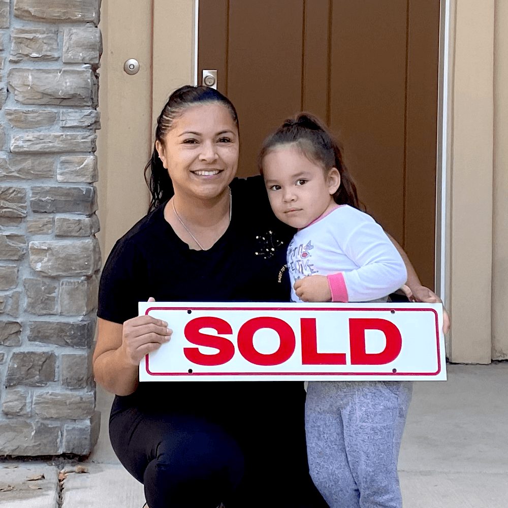 Perfecto Homes customers celebrating a completed home purchase